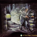 Scene from Les Miserables where Jean Valjean rescues Marius from the barricade and escapes through the sewers